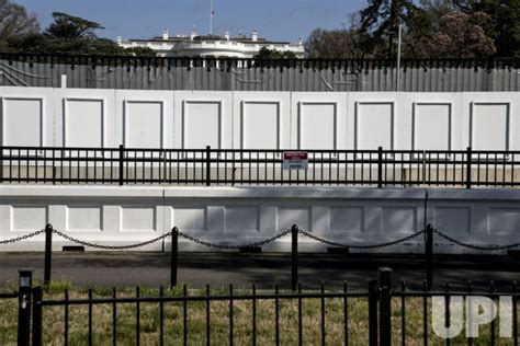 metal scaffolding being put up around the white house|Fencing put up outside White House, VP residence US Capitol.